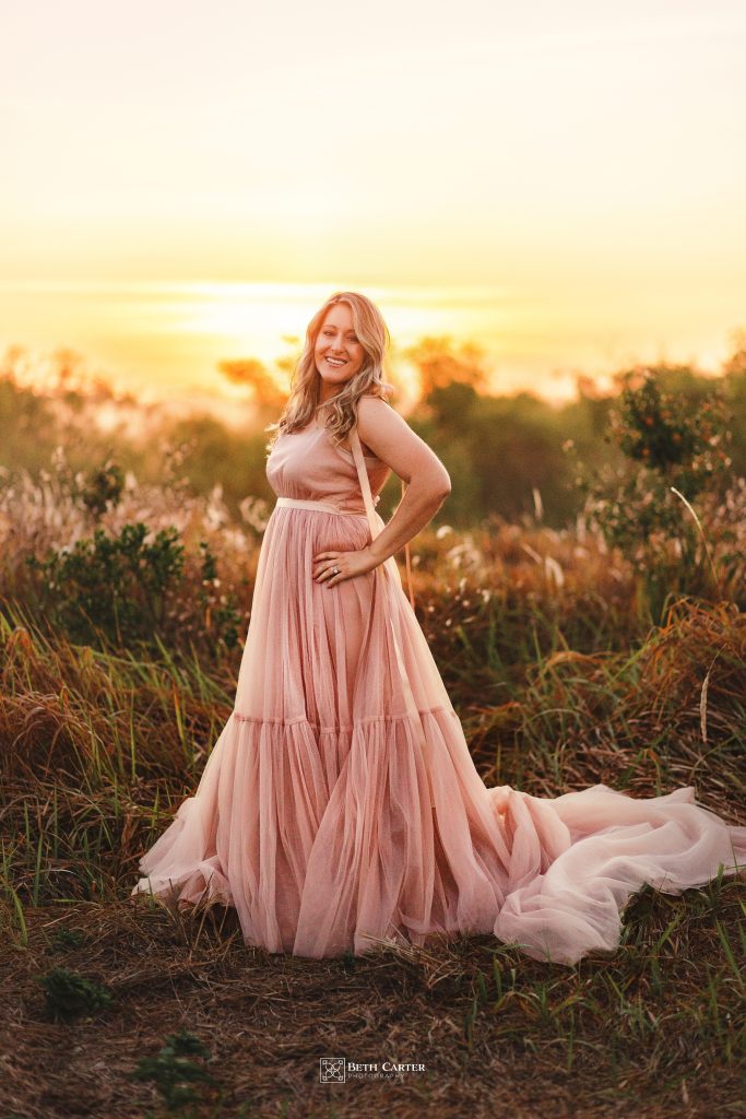 sunrise session of a mom and her daughter in beautiful gowns