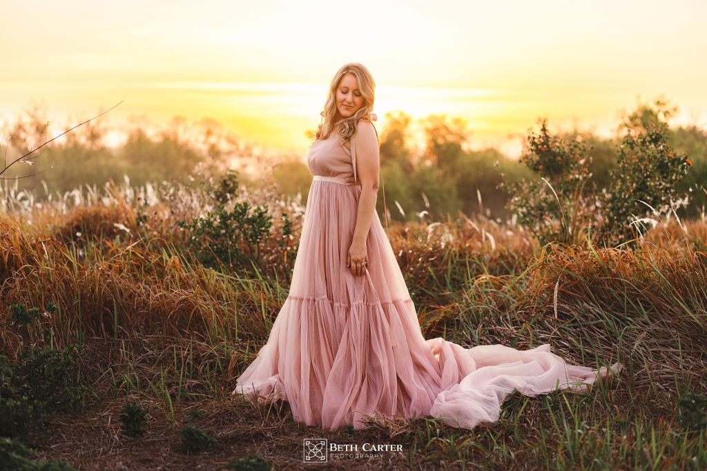 sunrise session of a mom and her daughter in beautiful gowns