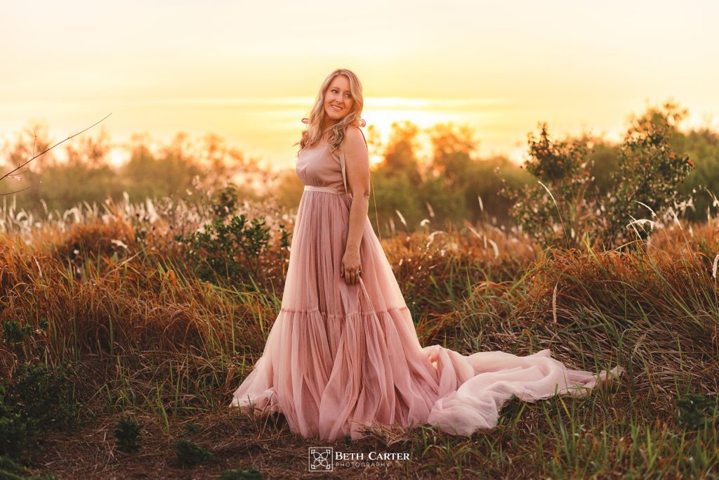 sunrise session of a mom and her daughter in beautiful gowns