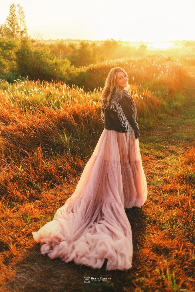 sunrise session of a mom and her daughter in beautiful gowns