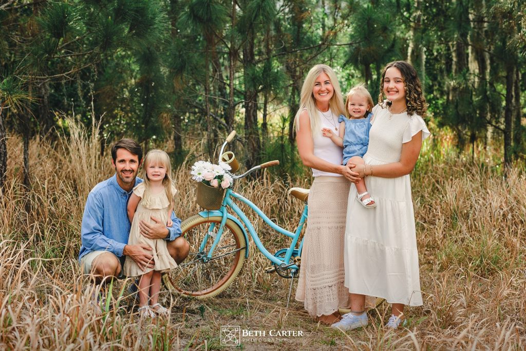 photo of family dressed for spring in a rustic setting in Bartow, FL